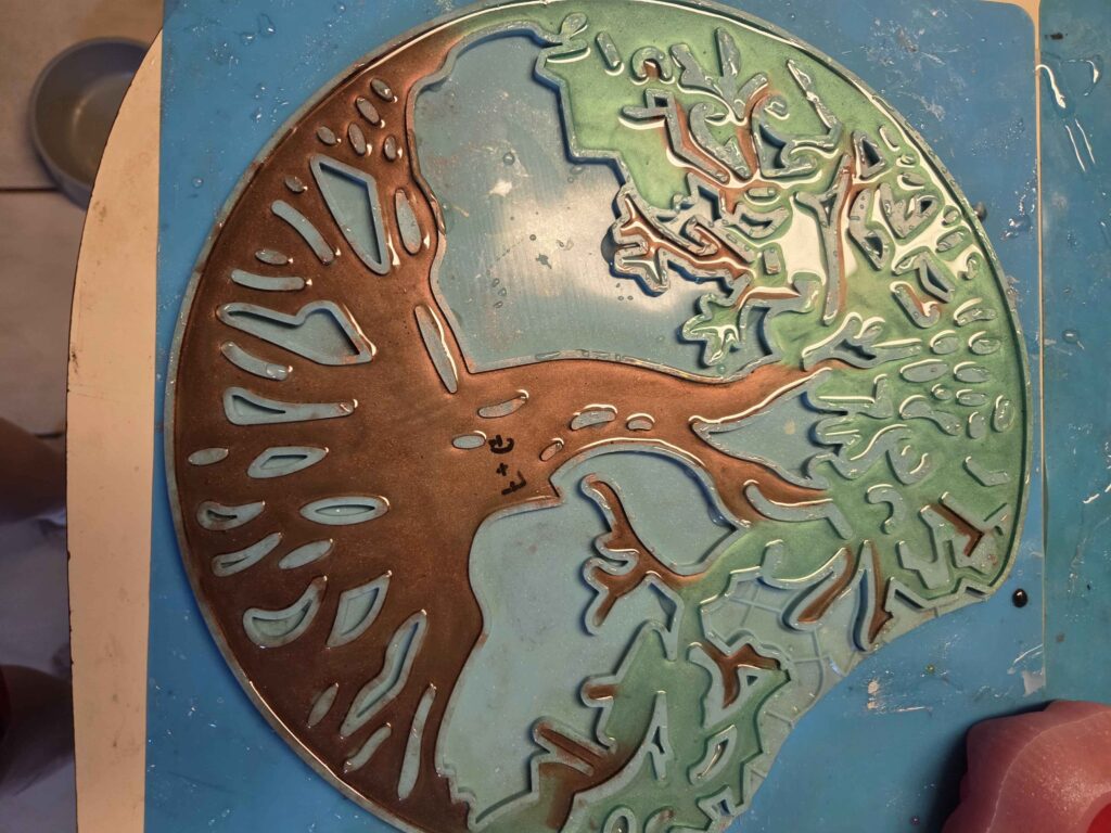Copper and teal resin geode